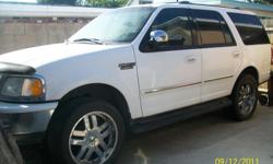 White Ford Expedition XLT Clean ,Runs awesome. 4 Wheel Drive, Speed control, 22's , 8 Cylinders, Automatic, Interior fabric light gray color,clean, not leather. Miles 120,309.