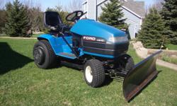 1995 Ford LS45 Lawn Tractor with 42? mower. Tractor has a Kohler Command 16 hp twin engine with under 650 hours. Hydrostatic transmission. Also included is a 42? snow blade, rear wheel weights and tire chains. All of this plus a trailer to haul it on.