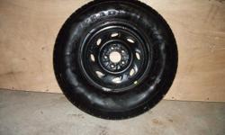 A spare tire and rim, never used, 235/75R15.&nbsp; PLEASE NOTE; shipping is paid by the buyer,
