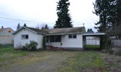 HUD home. Excellent opportunity to own home on larger lot close to Boeing, freeways, & activities. Has attached carport w/detached 2-car garage w/woodstove. Updated w/vinyl windows. Inside-two baths w/three bedrooms. Large kitchen is center of home. Sold