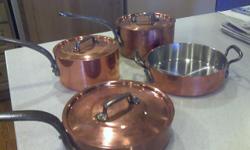 Bourgeat Copper--18/10 Stainless Steal Interior and riveted cast iron handles. Stamped-Certified on pans.
2 Saucepans with lids (two sizes)--sale for $239.00 each new
Saute Pan--sales for $195.00 new
Brazier with lid which fits on Saute pan as well--sales