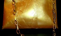 Francesco Biasia Gold Split Leather Hand Bag, smaller w/gold chain. Interior shows age & use, but the outside is in great shape. Made in Bulgaria.
PayPal or Google Checkout accepted. I have a 100% seller rating on Ebay (under the account name of