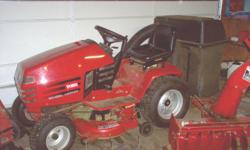 Toro Wheel Horse Garden Tractor
17hp Kohler Engine
Hydrostatic Transmission
Lots of attachments
Mowing deck
Snow thower w/rear wheel weights & chains
Lawn de-thatcher & sweeper
Well used 1yd wagon