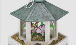 GAZEBO BIRDFEEDER AND YOU GET FREE SHIPPING .
Birdy gazebo holds plenty of food for famished flyers behind its stained-glass panels.
Wood with rope hanger. 8 1/4" x 7 1/4" x 10" high.
BUY ME NOW ON PAY PAL HERE!