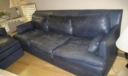 Navy blue overstuffed casual style 98'' x 40'' sofa and 45''x'40'' chair (big pieces!) and matching 38'' x 26'' ottoman. Feather filled and real leather. From the Leather Center. Excellent condition. Pick up only.