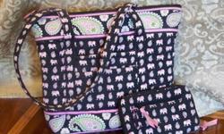 Gently used Vera Bradley purse with wallet. Contact Neil @ 770.380.1571