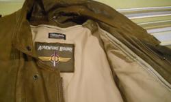 LEATHER BOMBER JACKET--Originally purchased from Wilson's Leather.&nbsp;&nbsp; Supple, autumn brown, genuine leather.&nbsp; &nbsp;Adjustable waist snaps. &nbsp;Waist measures 38" on largest position, shoulder measurment is&nbsp;23" across, sleeves are
