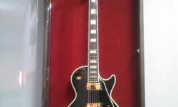 What we have here is a like new guitar in perfect condition ! All hardware is gold plated ,ebony fret board with block inlays.It still has the original strings on it and realy has never been played since new in 2004! Come see it at Schumacher Music and