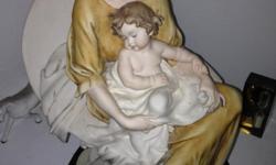 Figurine by the late Guiseppe Armani made in 2000. Beautiful figurine of a mother gracefully holding her child on a white cloud for a great value. Perfect gift for a mother. Call/Text: (561) 688-3675 Mike
