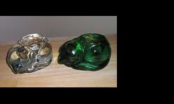 This is a set of two sleeping cats.&nbsp; They are glass candle holders in good condition