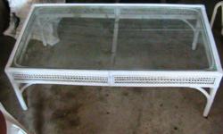 Wicker & Glass coffee table . good condition. only $30.00 call Mike -.