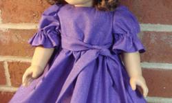 Glittery purple party dress is trimmed at the hem with lace and has a matching sash and headband. Puffed sleeves, full skirt, and fully lined bodice. Back velcro closure for easy dressing. Please view at JanetsStore@etsy.com where you will find other doll
