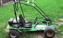 Full size go-cart by Carter. 9 horse Honda motor. Headlights up top, roll cage, regular seat belt. Belt to chain jack shaft, POSI rear end. Please call 651-500-3058.