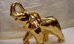 THIS POTTERY ELEPHANT GLEAMS. THE HAND DECORATED GOLD OVERLAY. THE PIECE IS IN EXCELLENT CONDITION.
WWW.TOPHATSELLS.COM