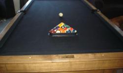 Gorgeous 8ft Slate Pool Table ? Excellent Condition
Black Felt
Includes balls, 6 sticks and with support hardware for difficult shots with wall-mount stand
Also includes table cover, 9-ball rack, 3 pool books & a pool wall clock
Bought from Buckhorn