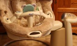 Graco Soothing Baby swing gently used and in excellent condition - plays several different tune and sound effects, vibrates rocks and swings at different speeds soothes baby in so many different ways paid $165.00 asking $75.00 works on batteries and on