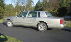 1997 LINCOLN TOWN CAR - SIGNATURE SERIES. NICE SMOOTH RIDE. COLOR IS CALLED PEARL. ALL LEATHER INTERIOR. IT IS IN A GARAGE AND HAS 143,000 MILES. SINGLE OWNER. RUNS BEATUTIFULLY. NO AIR OR CRUISE CONTROL BUT A SMOOTH RIDE. IF INTERESTED PLEASE CALL
