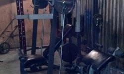 fitness gear smith machine with bench press, pull down bar, butteryfly and pull rowing bar
also comes with curl bar and two dumb bells
also has leg curl and preacher curl that goes on bench
comes with 2-45lbs, 2-35lbs, 2-25lbs 2-10lbs, 2-5lbs and 2-2.5