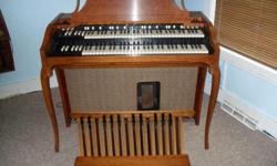 1963 Hammond Organ.&nbsp; It is an A102 French Provincial model.&nbsp; The&nbsp;serial number is 35036.&nbsp; This model is made from French Cherry wood and is in excellent condition, inside and out.&nbsp; It is in original condition, containing three 12