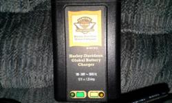 UP FOR SALE IS A HARLEY DAVIDSON 12V GLOBAL BATTERY CHARGER WITH CORDS IN EXCELLENT WORKING CONDITION...I'M ASKING $40.00 CASH FOR IT...YOU CAN REACH ME AT 816-714-8188 ASK FOR ROB