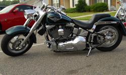 HARLEY DAVIDSON FATBOY * 2000model, customize ,lowered & raked,racing cam and nitros,,lots&lots of crome !!only 9000miles (i have $40,000 plus in this bike ) always kept inside