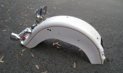 like new fenders for harley heritage no marks on paint . color white pearl gold.call to see.must sell