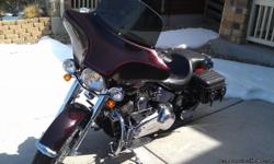 2007 FLSTN it has 12,491 miles on it the color is Black Cherry all maintain has been as per HD specs by an HD auth dealer. I've added a HD one piece seat for rider and passenger, extra large fold down foot pegs for passenger, removable sissy bar, fog