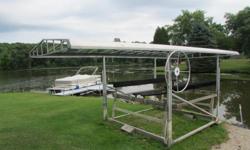 Hewitt 2500 # cantilever boat lift with canopy.&nbsp; 88" between bunk rails, bunk rails and carpet replaced last year.&nbsp; Canopy ( dark blue )&nbsp; is 9'4" x 23 ' ( like new )
44360 Dawn Drive.&nbsp; Hillsdale, MI&nbsp; 49242&nbsp;