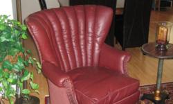 Burgundy high back chair in good condition.