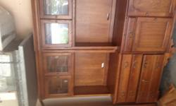 Extremly nice oak three piece set. Corner cabinet with two side cabinets. Real good condition. -- ask for Teresa