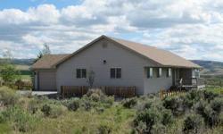 MOVE YOUR FAMILY to Idaho Falls!! Put them in this lovely home with an unsurpassed view of the surrounding mountains .Plenty of room for horses,etc. (they would really like you to build them a shed first !) Breathtaking views from the 20'x30'front