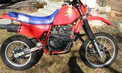 This is a 1983 Honda XR 500. This bike is not street legal but has a title. The bike is complete with tool kit. The tires are new with only a few rides on them. No seat tears. Motor has new Wisco piston and valves were ground. Transmission and clutch were