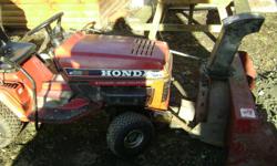 twin cyl. 5 speed liquid cooled honda rider,exellent shape recently serviced, new battery, weight box tire chains, 48 inch snow blower throws snow 35 feet. has a 38 in &nbsp;mowing deck please call jerry --