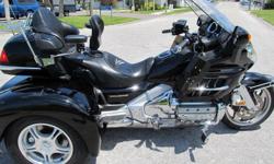 &nbsp;THIS GOLD WING HAS ALL THE STANDARD FEATURES HONDA OFFERS SUCH AS, AM/FM STEREO, INTERCOM, ELECTRIC REVERSE, CRUISE CONTROL, DUAL EXHAUST, ELECTRIC ADJUSTABLE HEADLAMPS, AND MUCH MORE.