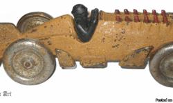 Cast iron race car about 10.75" inches in length. Wheels still roll well. There is some slight rust on the wheels. The front axle is eccentric on purpose. Because this piece not only rolls, but when it does, the eccentric on the front axle drives the