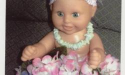 I DESIGNED THIS DOLL, SHE IS SITTING IN A CLAY POT SURROUNDED BY BEAUTIFUL LILAC & PINK FLOWERS, SHE STANDS 12'' TALL. SHE HAS A TURBAN OF FLOWERS & A HEADBAND ON HER HEAD, ADN SHE IS WEARING A CORAL NECKLACE. SHE IS READY FOR A LUAU!!!!!!!!!!
ITEMS CAN