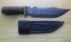 Blade is 9 1/4" long from tip to hilt. Handle is 4 3/4" long. My brother had handle and blade fitted while he was in "Desert Storm". Comes with leather sheath which was also hand made. Used,not abused. Cash and Carry. Contact matt at
