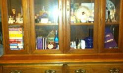 Tell city furniture dark oak, lighted china hutch for sale. Overall deminitions are 74" high x 54" wide. Asking $400.00, OBO.
