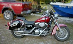 i got a 1997 1500 kawasaki that has just had the engine and trans rebuilt it has new hard saddle bags and a trunk and i have the sissy bar and mounts for it to need 2800.00 for it i just spent right 2300.00 on it.it is red and black...... The other one is