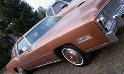 This car was a one owner car until I purchased it recently. It had always been garaged and only 75000 miles on it. &nbsp;I have now put a couple of thousand more miles on it and it runs great. &nbsp;It is copper in color with brown leather interior,