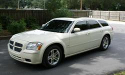 I'm selling my 2005 Dodge magnum with only 76,720 miles. It runs and drives great needs nothing. It has 22" inch really good condition the interior is the offwhite an offwhite interior in very good shape no tears or rips.&nbsp;&nbsp;&nbsp;