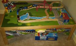Imaginarium train set (60 pieces) and table.&nbsp; Excellent condition.&nbsp; Perfect gift for Christmas.