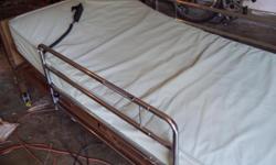 barely used has remote and hand crank mattress included rails also