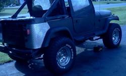 Jeep Wrangler 1991, Matte Black, Lifted, Heat, CD Player, 2 seater, Sound bar, Bikini Top, Back Truck Bed, Needs work, no inspection sticker, cracked windshield, needs rear view mirror.