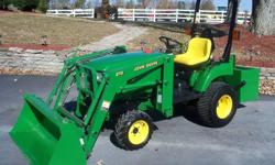 It has John Deere 210 front hydraulic loader with down pressure. It is 4 wheel drive. It has a quick attach loader and bucket. It has a diesel engine with only 384 hours! It has a rollbar. It also has a drawbar, 540 PTO, toplink and a 3 pt hitch. It also