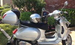 This is a 2009 Vespa Granturismo GTS 250 LE. I bought it NEW in 2011. There is 1200 miles on it--absolutely nothing on a Vespa. VESPA is the cream of the crop of motorscooters.&nbsp; Rides with EASY, SMOOTH POWER. Perfect for commute to save money and