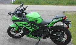 &nbsp;2014 Kawasaki Ninja 300 Special Edition 1790 miles has ABS brakes and a 5 inch lowering kit Excellent condition, color green great starter bike