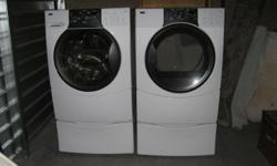 For Sale: Kenmore Elite High Efficiency Washer and Dryer Set, With Stands. White, Front Loading. Comes with Hoses and Original Paperwork. Electric Dryer. Work Great. I am moving and will no longer have room for these.
