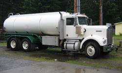 1981 Kenworth Model W-900, 3,000 gallon T/A water truck. Big Cam 400 Cummins, Fuller 18 speed transmission. 40,000 lb. differentials. 234" WB. 11R 22.5 front and rear tires. Cummins 6AT 3.4 120HP pump motor. 3 front and 2 rear sprays. Berkely Pump.