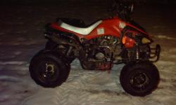 Kids ATV 125 110cc motor, Three speed foot shifter transmission with reverse. This is a good ATV for a beginner rider. There is a local dealer for parts and repairs if needed. This is a TAO TAO brand ATV. This ATV is registered till 2012. The helmet goes